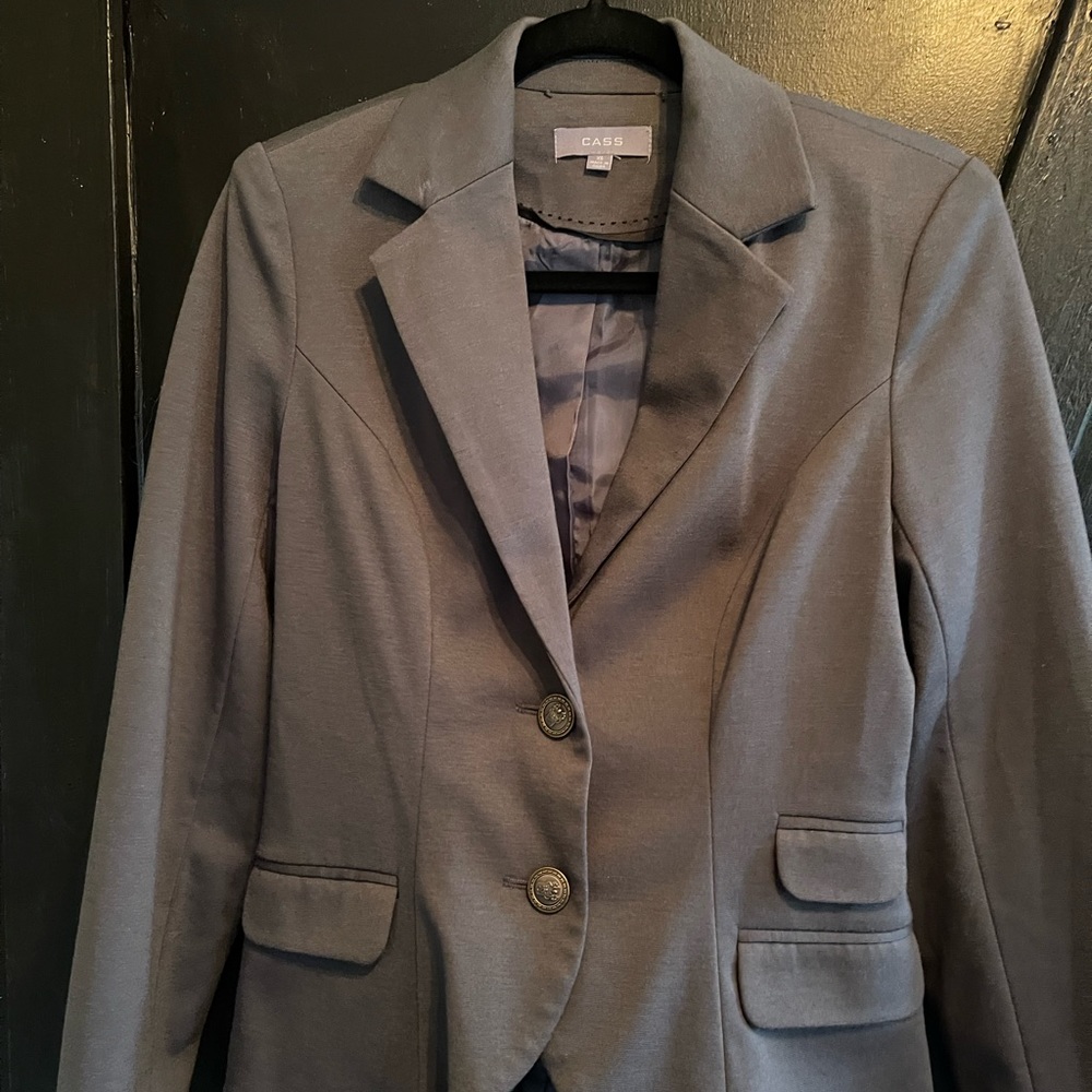Cases suit jacket with elbow patches.